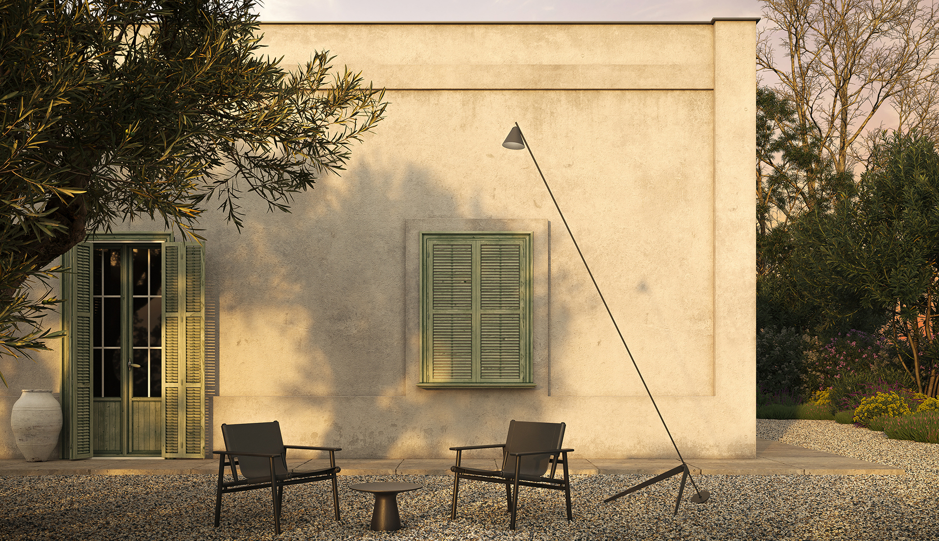 Image of Vea outside a house, illuminating a small table and two chairs on a gravel surface.