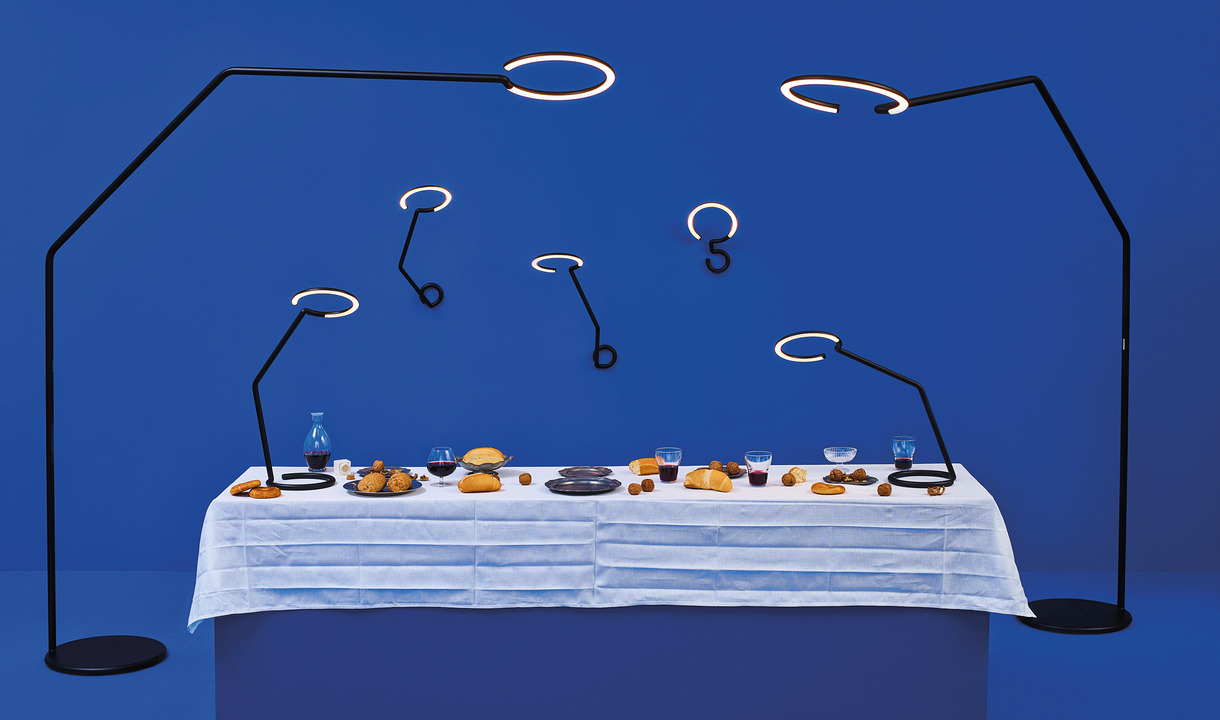 Picture of the Vine Light family of lamps: wall, table and floor.