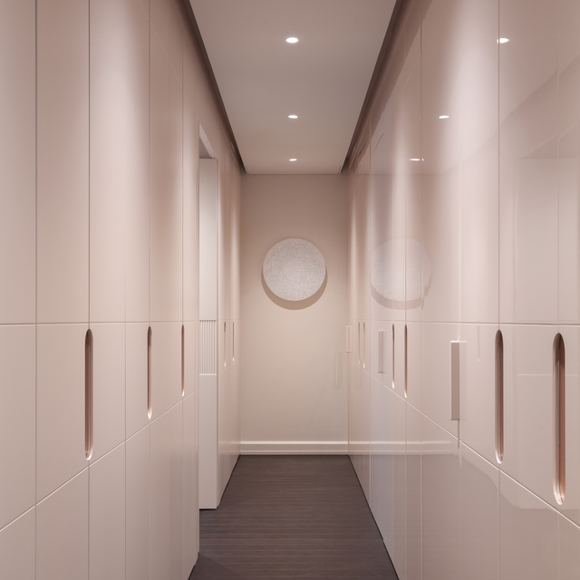 Wardrobe corridor lit with recessed Everything 80 fixtures, providing compact and precise light seamlessly integrated into the ceiling, in harmony with the space’s minimal design.