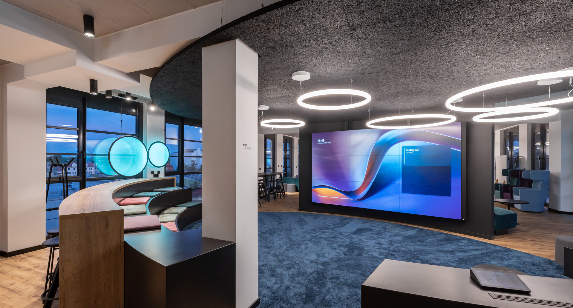 Picture of the office lobby with Discovery Vertical and Alphabet of Light Circular.