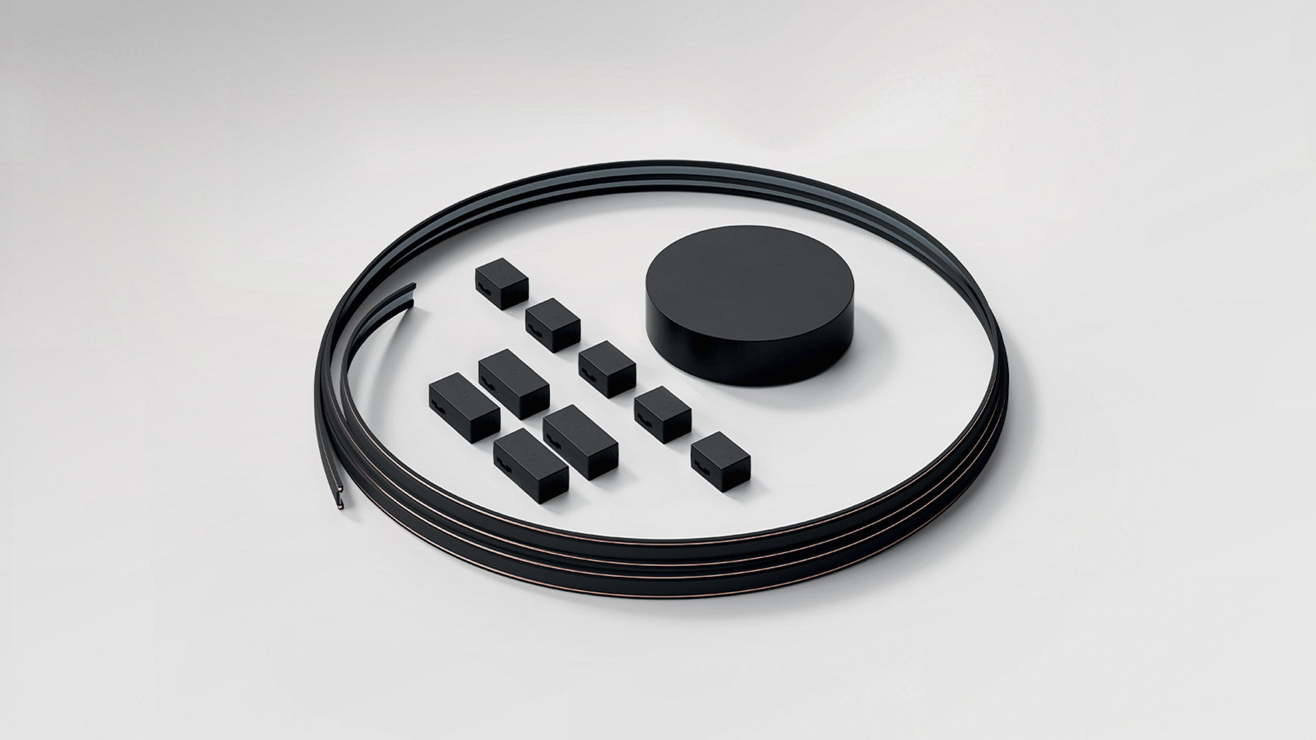 Artemide Sylt Stand Alone: six modular wall lamp configurations with thin cables and small black nodes, forming lines, curves, circles and spirals